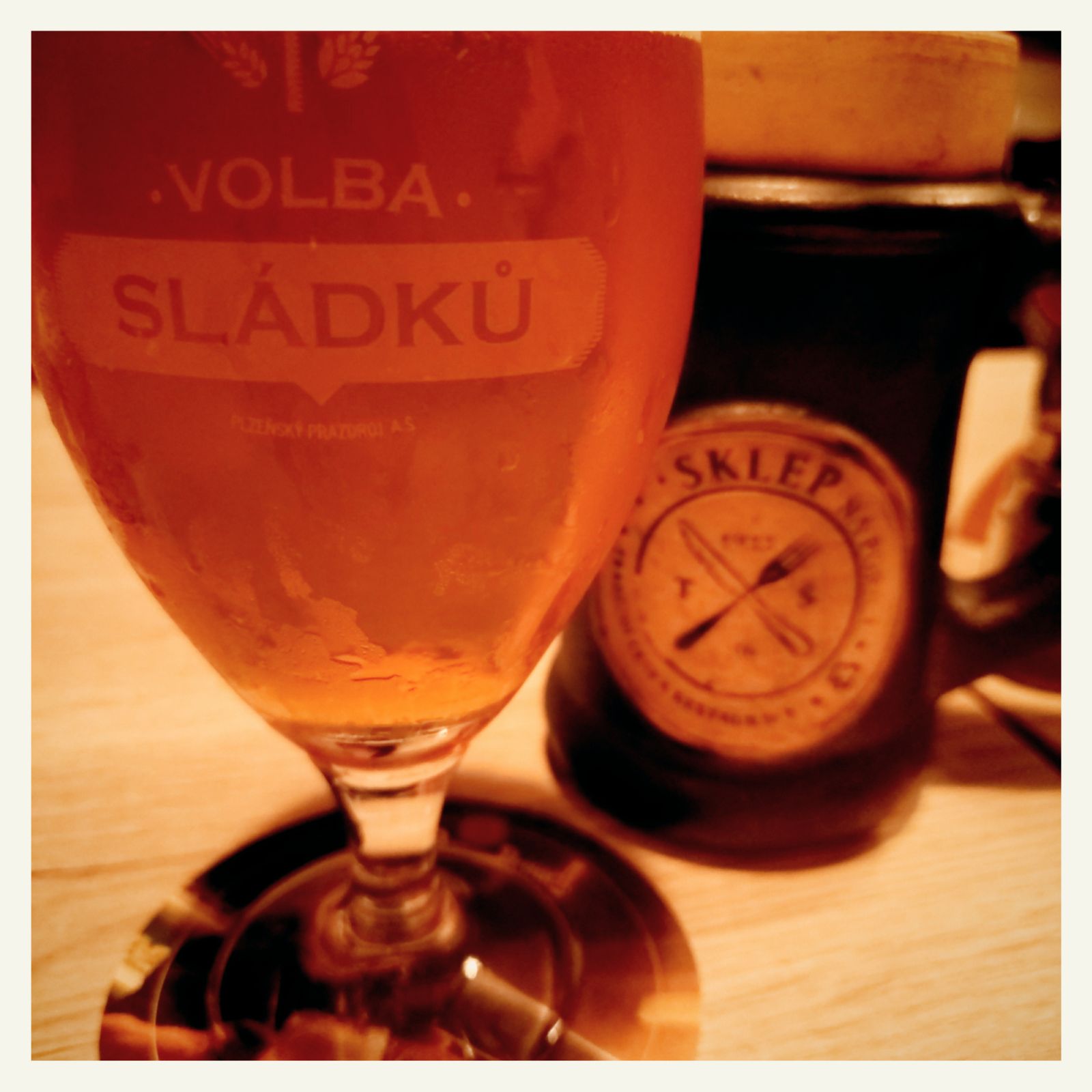 Sladku beer, and a might of Sklep restaurant behind.