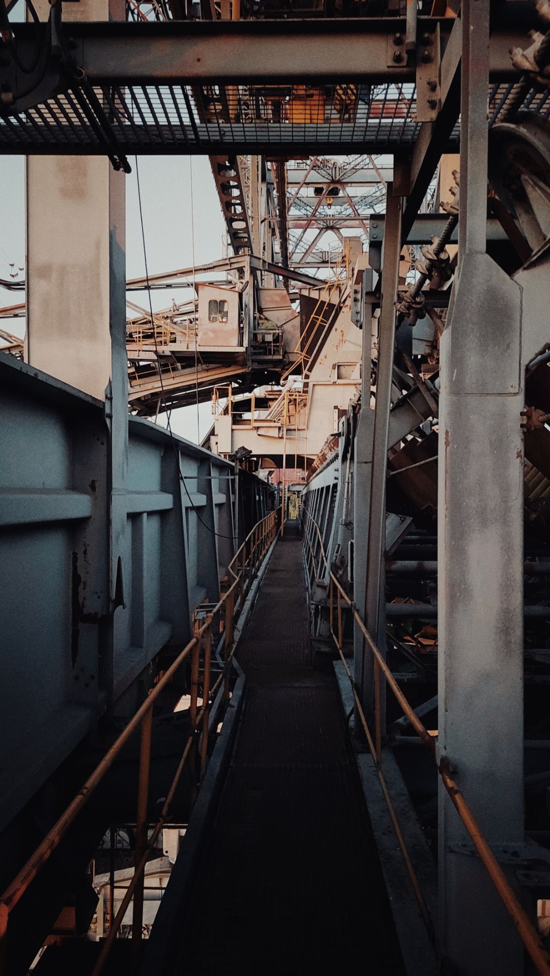 A walkway through a steel structure. 
