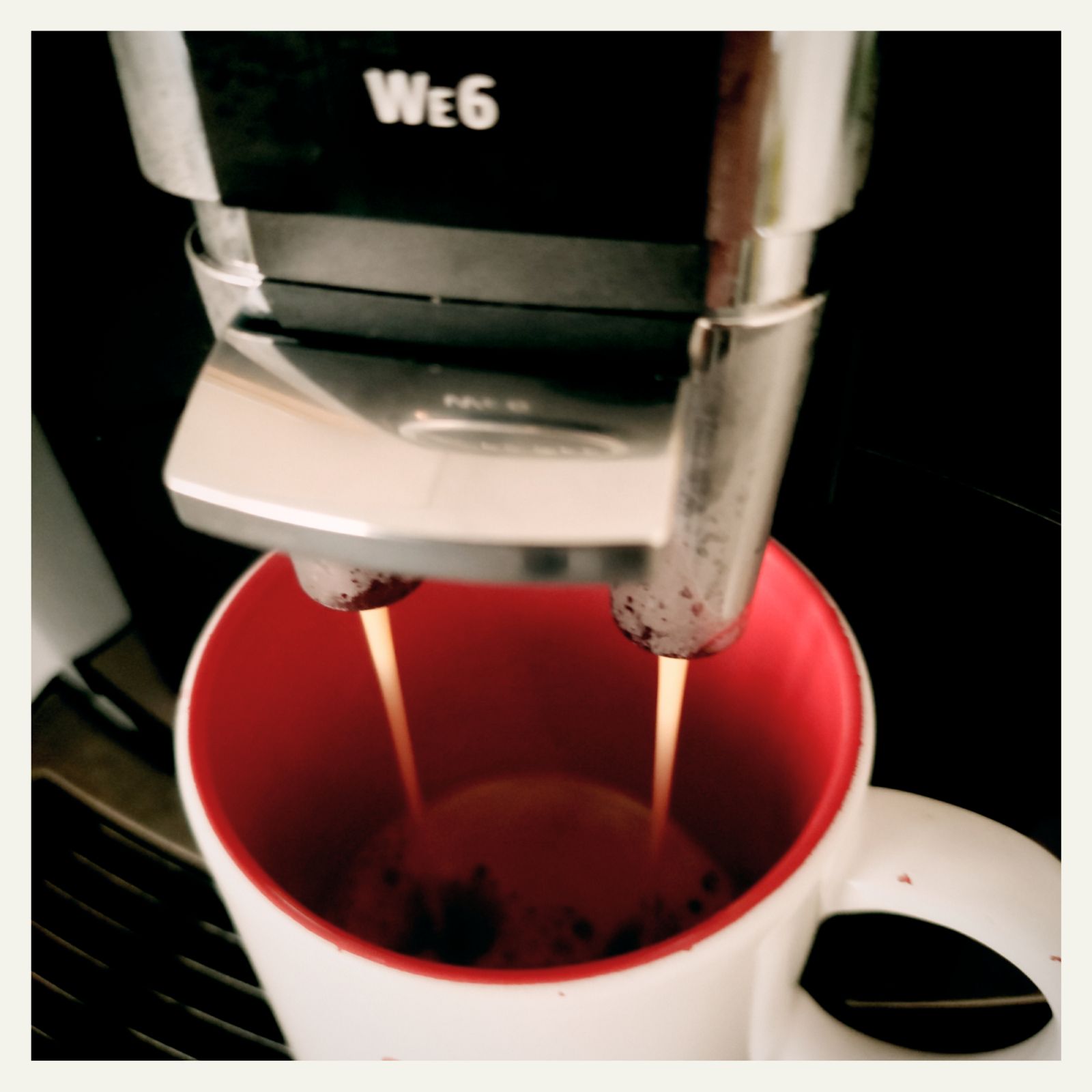 A coffee mug filled by a WE-6 machine. 